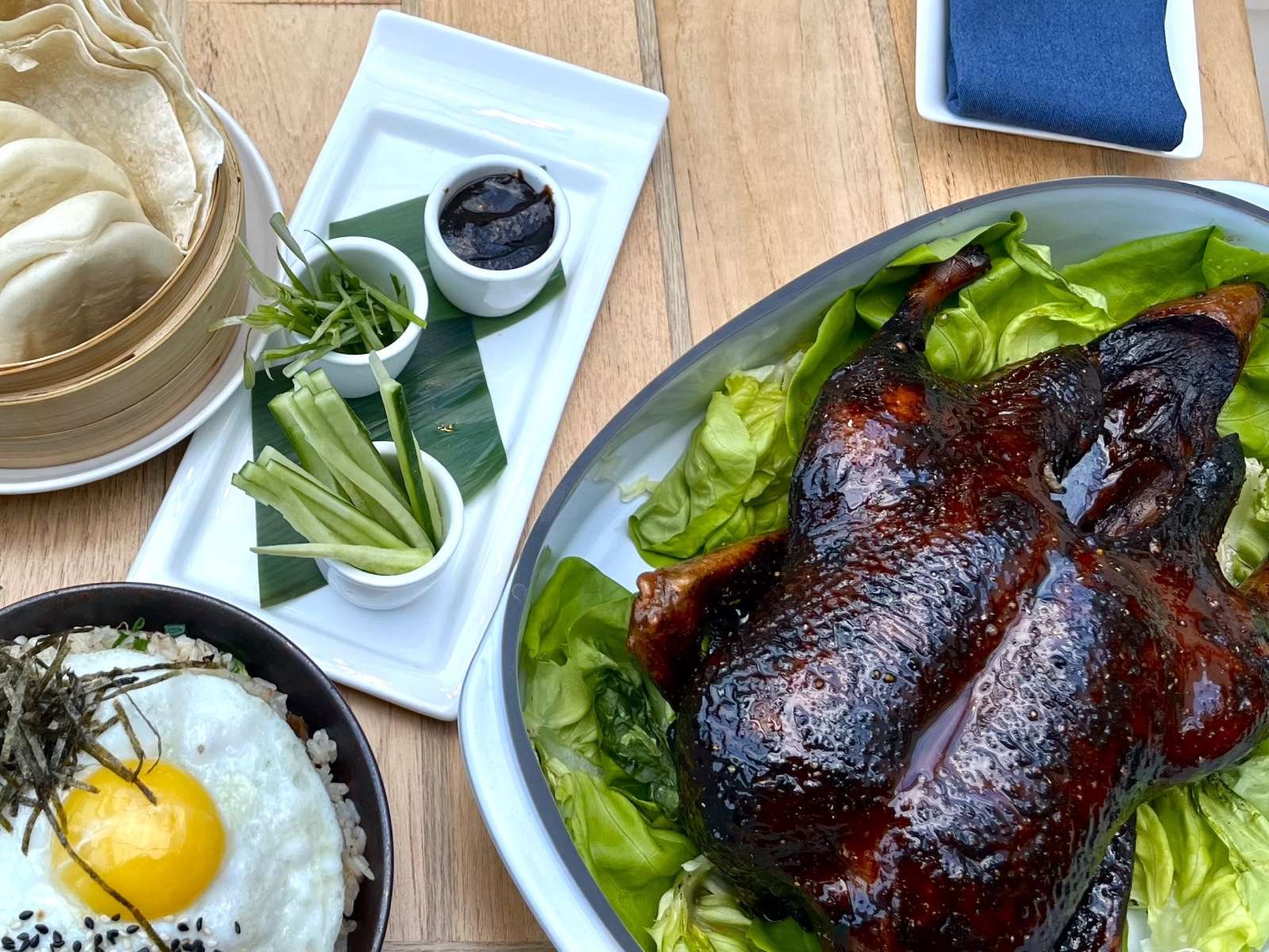 DEP Duck Month 2 a whole roast duck served on a bed of greens