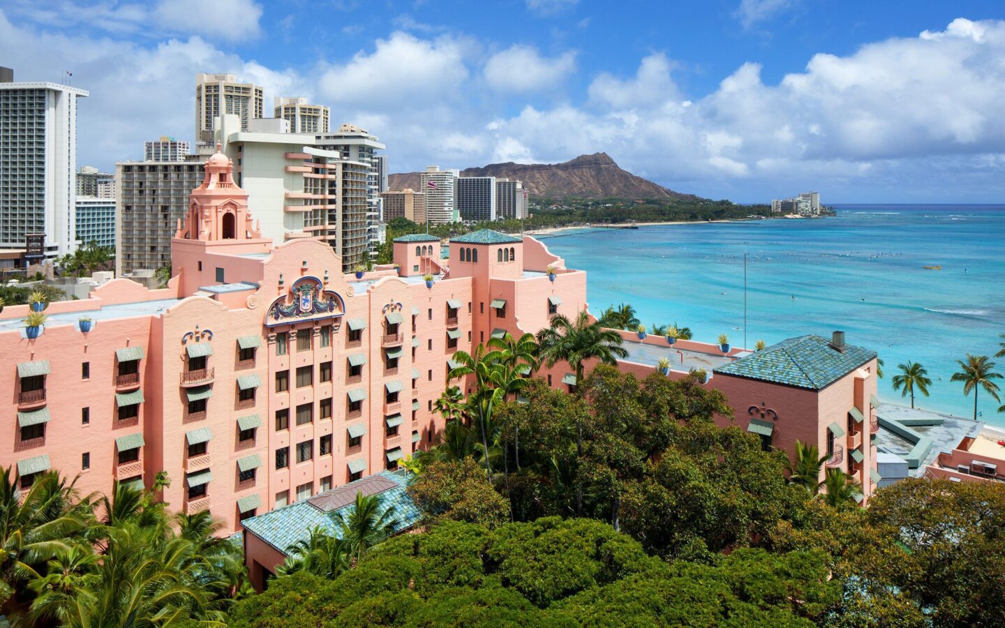 pink building near body of water during daytime