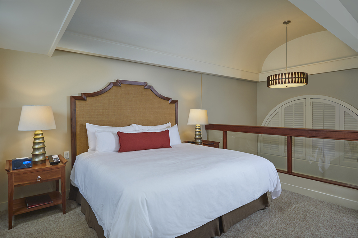 empty white bed inside room