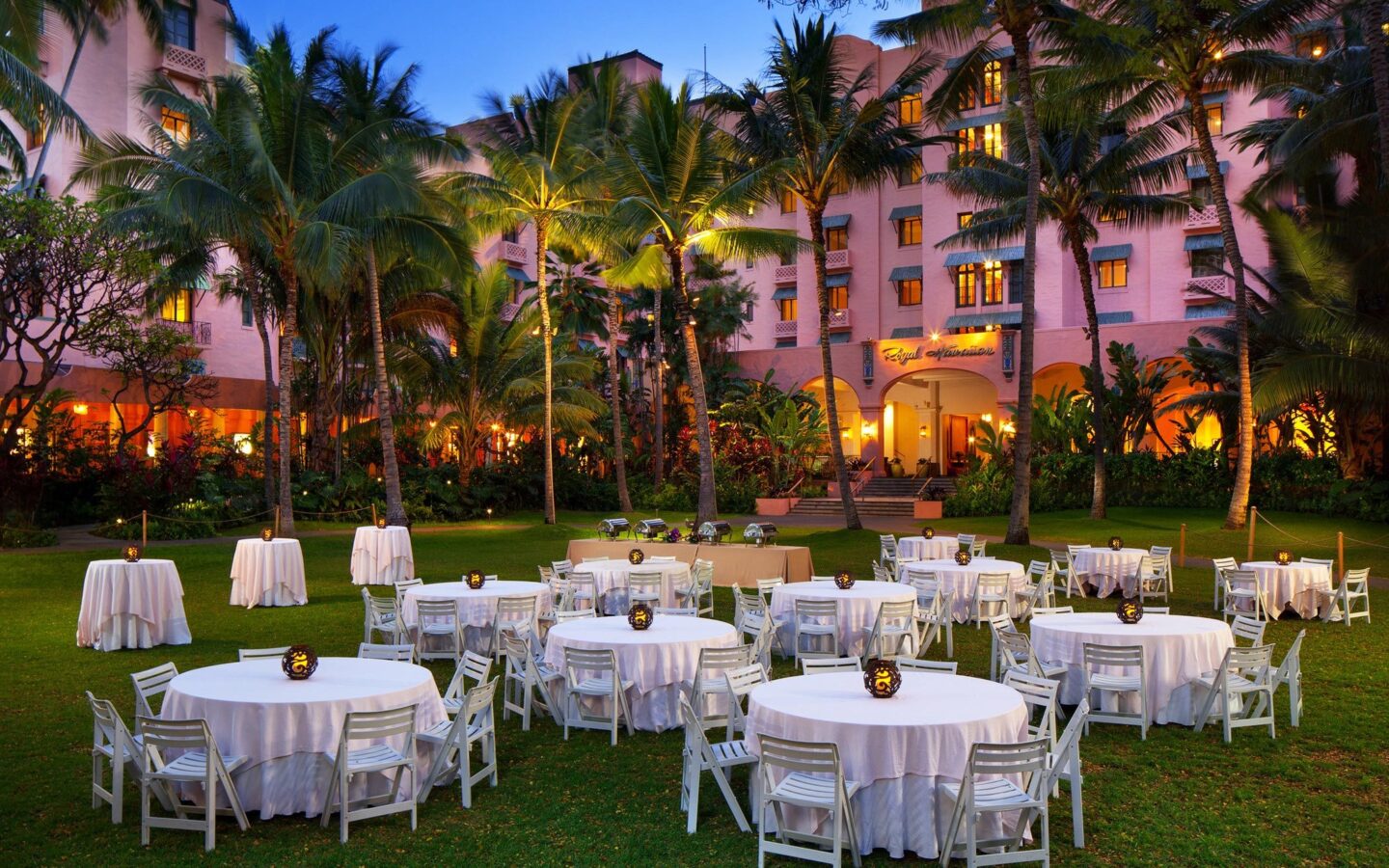 white table set in front of The Royal Hawaiian