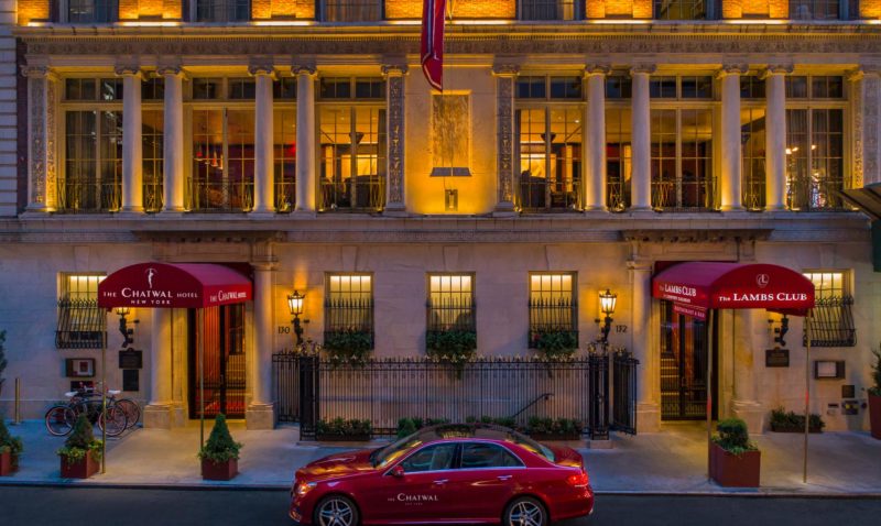 Hotel Exterior with Mercedes Benz House Car at night