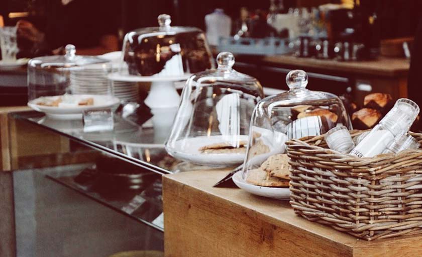 cookies in display cases on a cafe counter