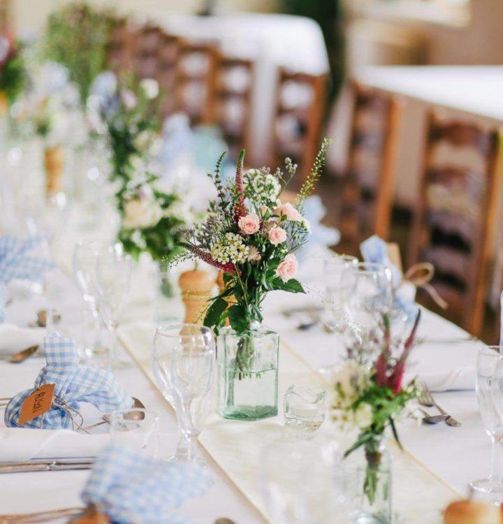long table with tableware for wedding dinner