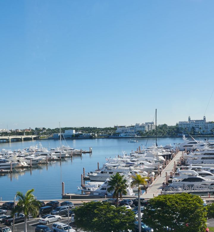 white boats on sea during daytime