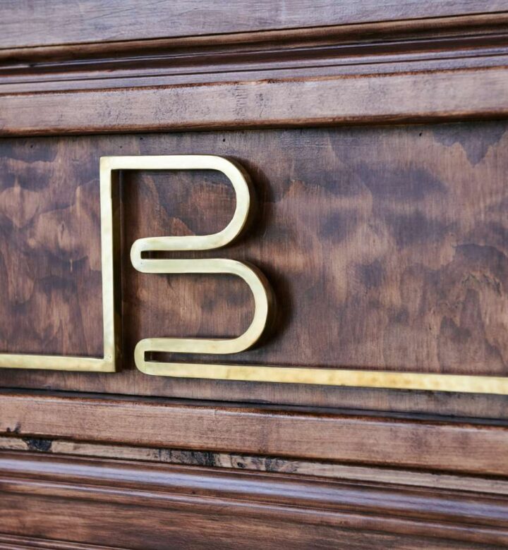 brown wooden board with letter b