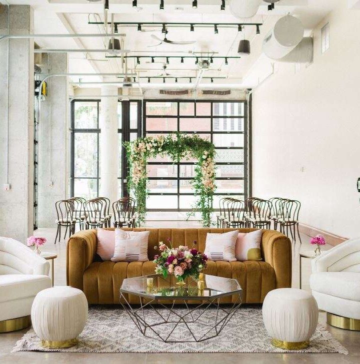 a living room filled with furniture and decor