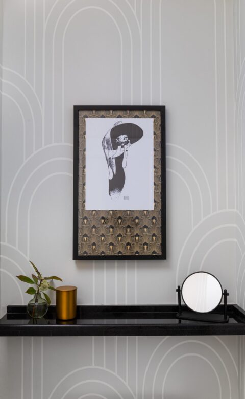 brown wooden framed man and woman portrait