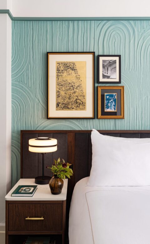 black wooden framed painting on wall