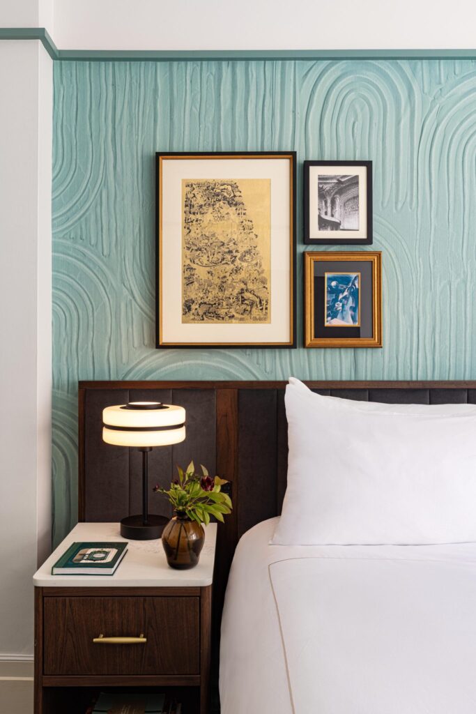 black wooden framed painting on wall