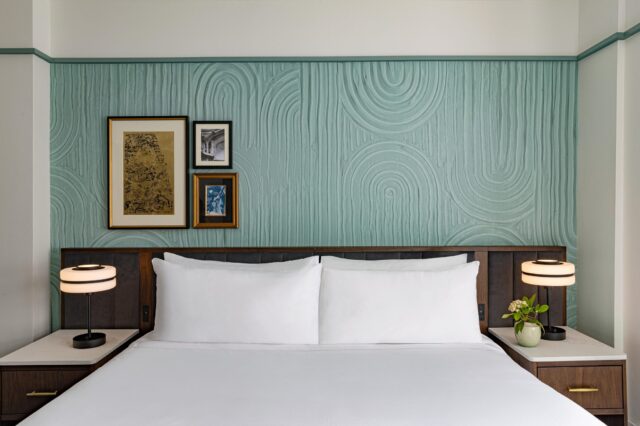 white bed linen with white pillows