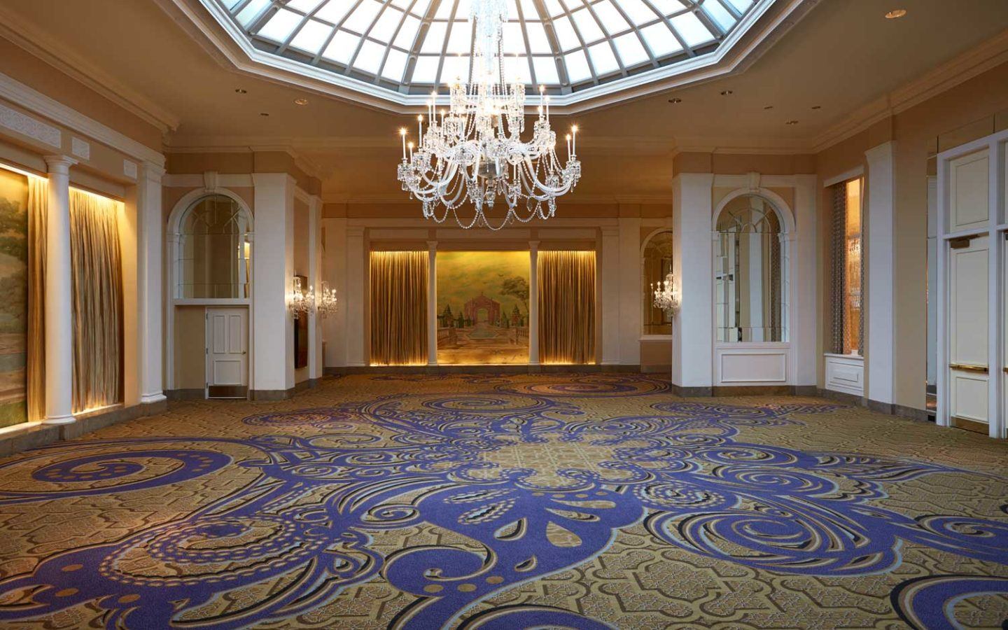 white candlelight chandelier in empty venue space