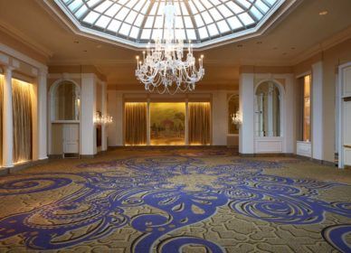 white candlelight chandelier in empty venue space