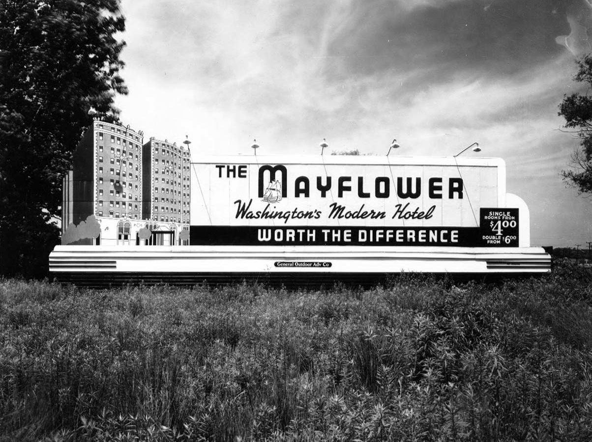 grayscale photo of 1983 hotel billboard for The Mayflower Hotel