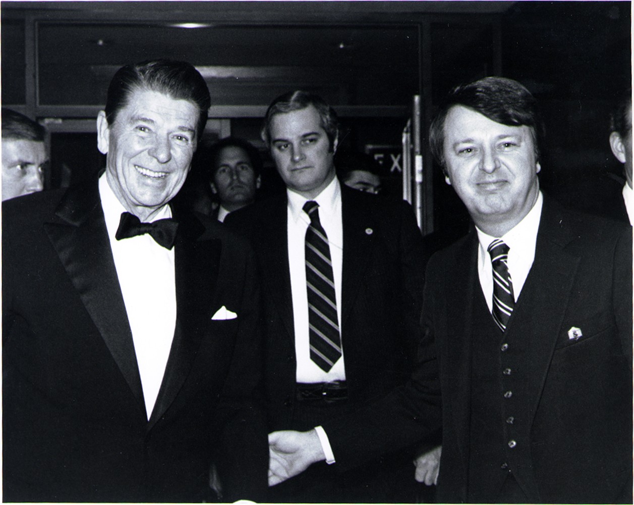 Ronald Reagan being greeted on arrival
