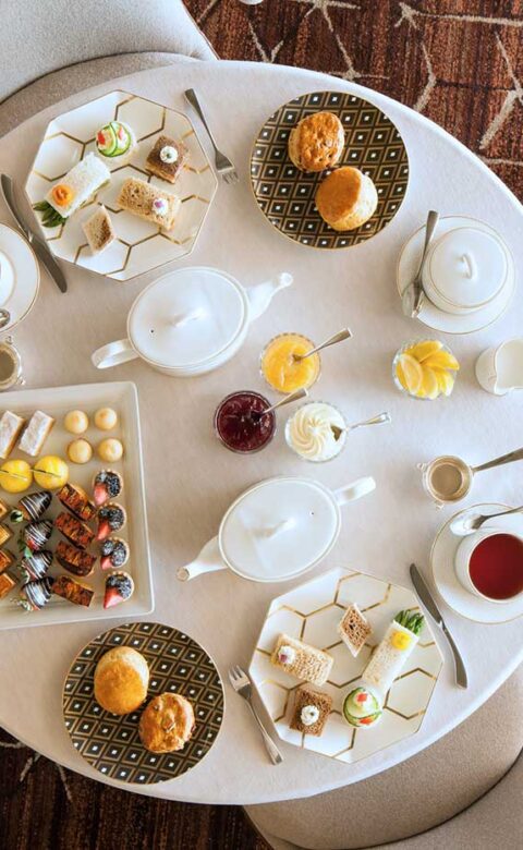 afternoon tea table prepared for dining guests