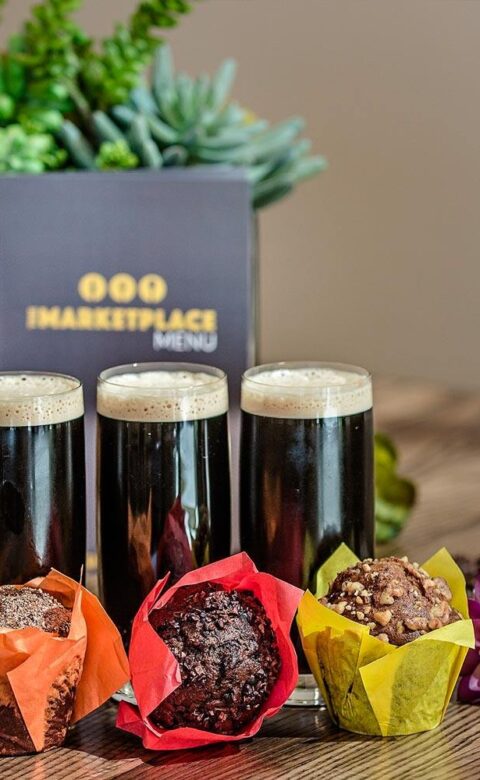 Muffins and dark beer on display at The Marketplace