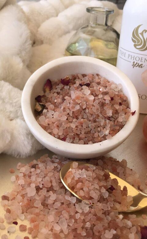 a bowl of rock salt crystals in a luxury spa