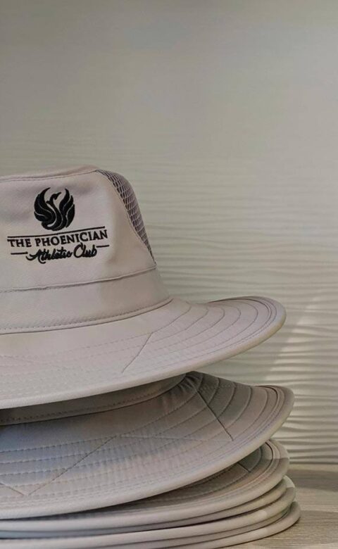 hats and reusable bottle available at the Tennis shop at The Phoenician