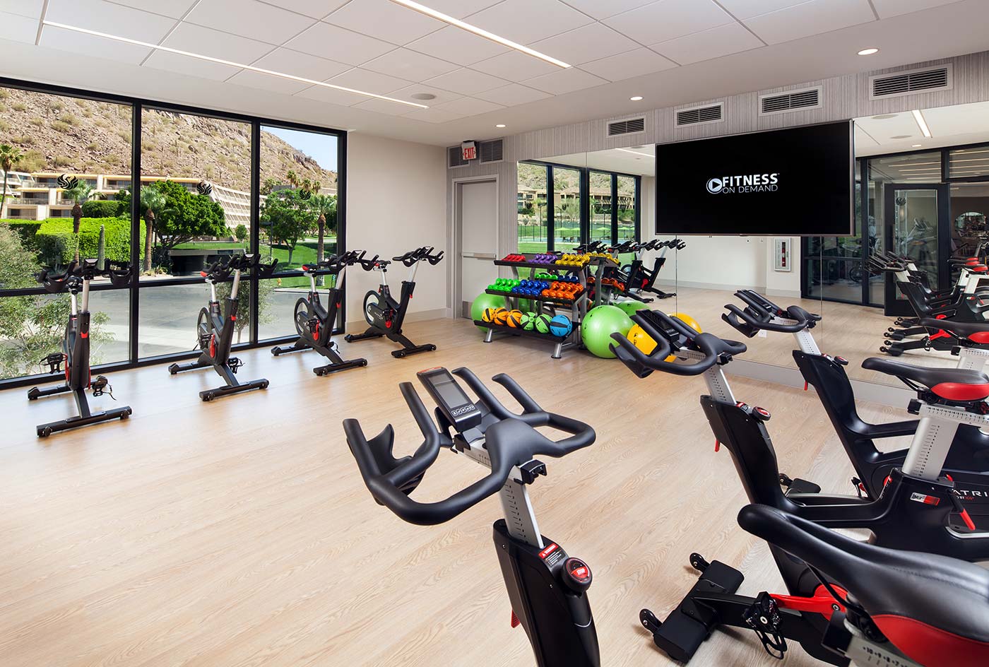 Athletic Club Movement Studio with exercise bikes and weights