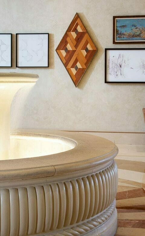 fountain in lobby with seating