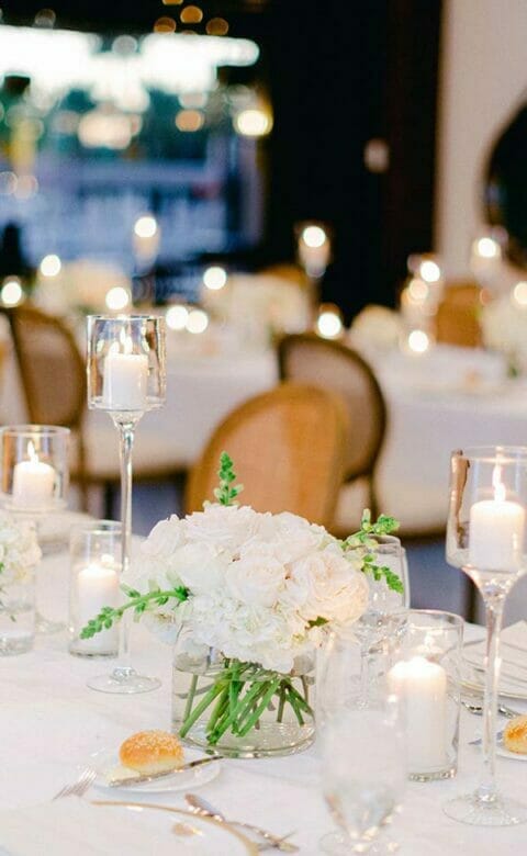 candle lit tablescape at wedding reception