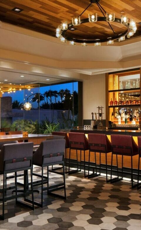 Mowry and Cotton bar area with high chairs lining the bar