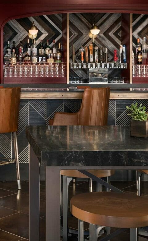 the Phoenician Tavern with high chairs lining the bar