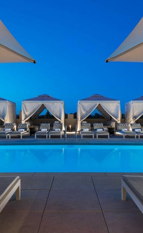 Rooftop Pool surrounded by cabanas at The Phoenician Spa