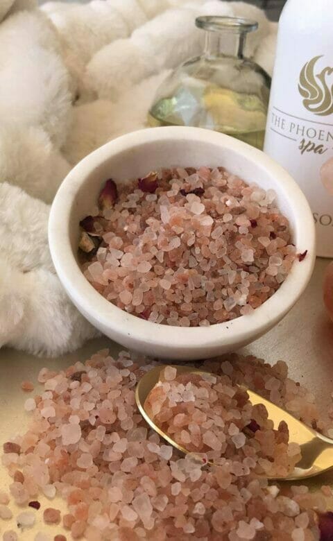 a bowl of rock salt crystals in a luxury spa