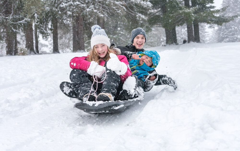 Sledding Through Lake Placid Winter Guide Grand Adirondack Hotel